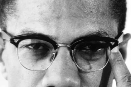 Malcolm X Assassinated During Speech in Manhattan